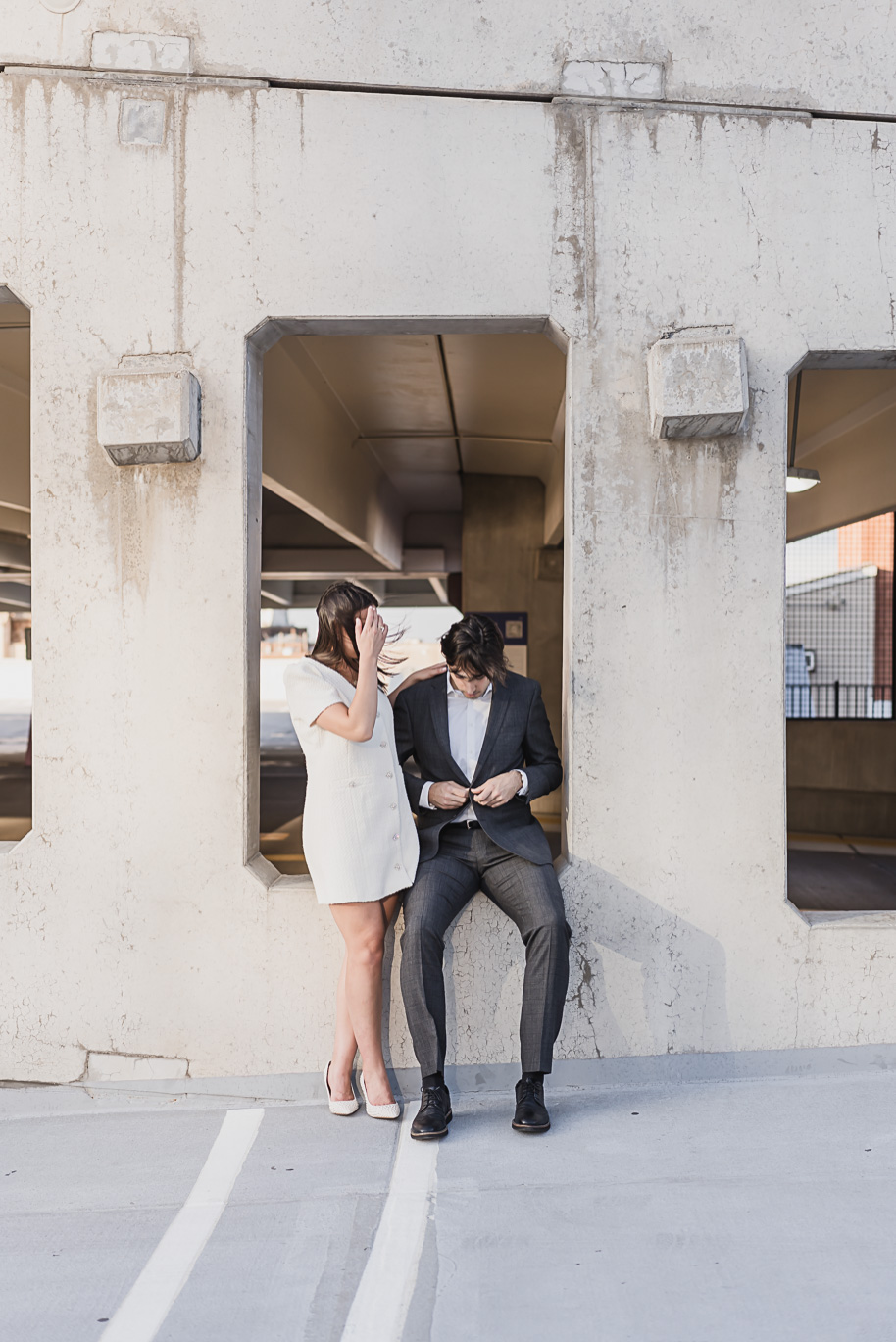 A classicly styled romantic downtown Detroit engagement session provided by top-rated Detroit wedding photographer Kari Dawson.