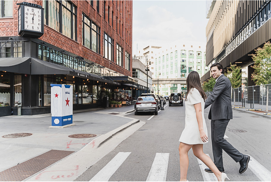 A classicly styled romantic downtown Detroit engagement session provided by top-rated Detroit wedding photographer Kari Dawson.