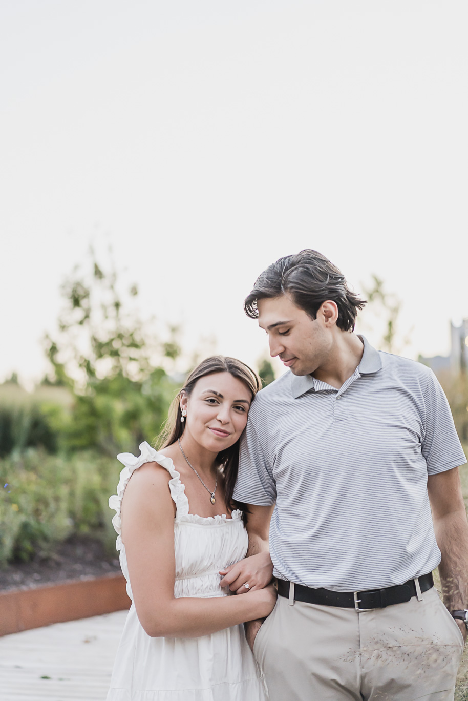 A classicly styled romantic downtown Detroit engagement session provided by top-rated Detroit wedding photographer Kari Dawson.