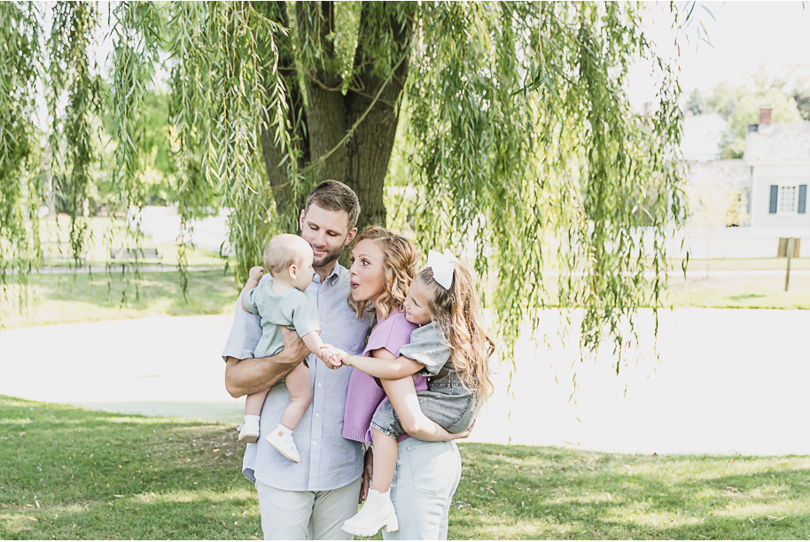 A fun Greenfield Village family photo session in Dearborn, Michigan provided by top-rated Detroit portrait and wedding photographer Kari Dawson.