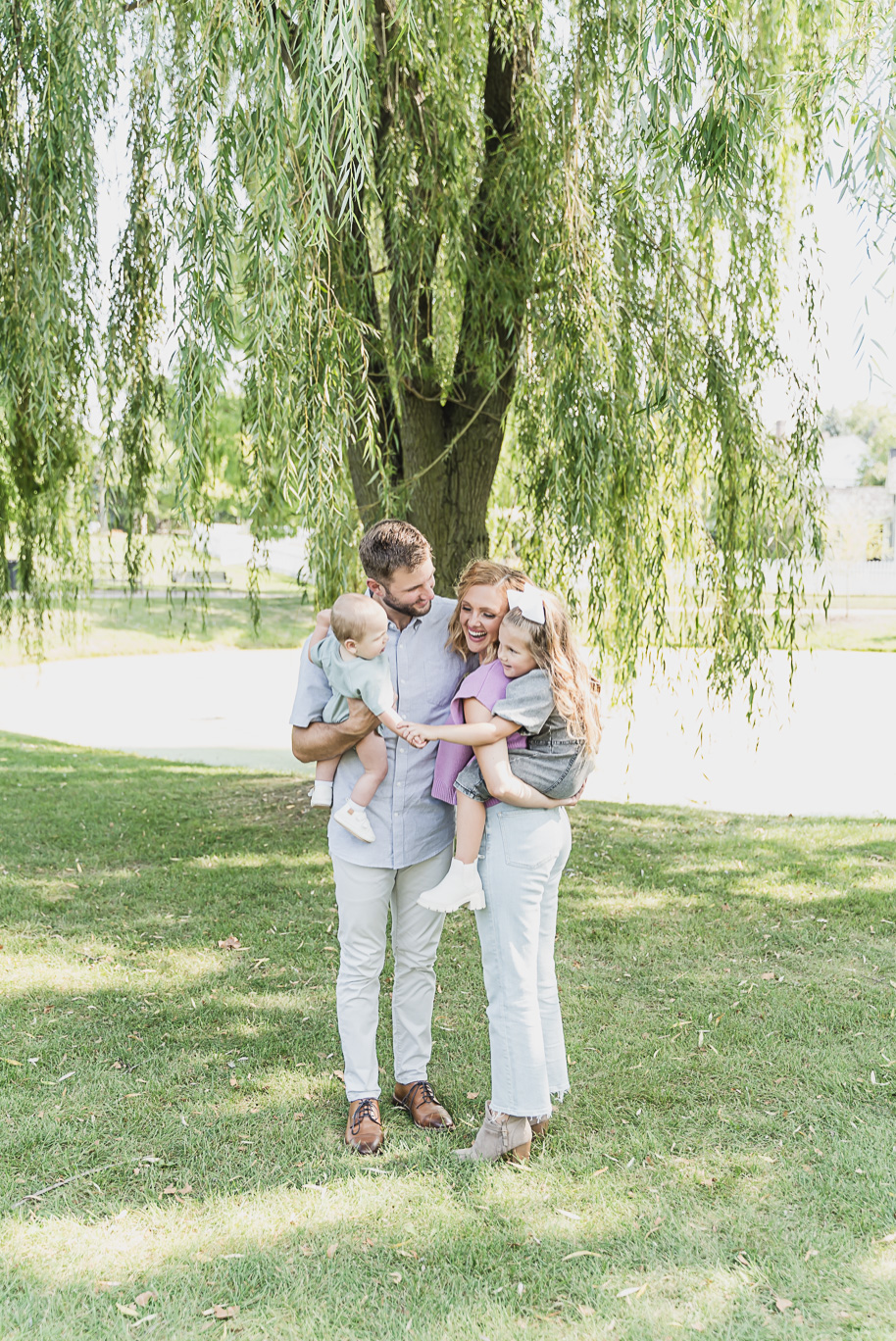 A fun Greenfield Village family photo session in Dearborn, Michigan provided by top-rated Detroit portrait and wedding photographer Kari Dawson.