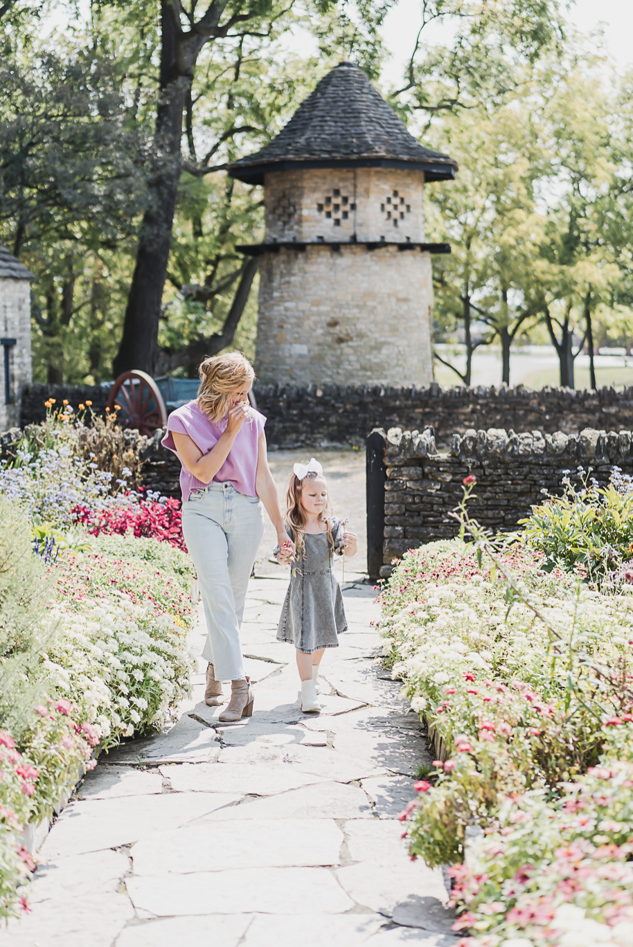 A fun Greenfield Village family photo session in Dearborn, Michigan provided by top-rated Detroit portrait and wedding photographer Kari Dawson.