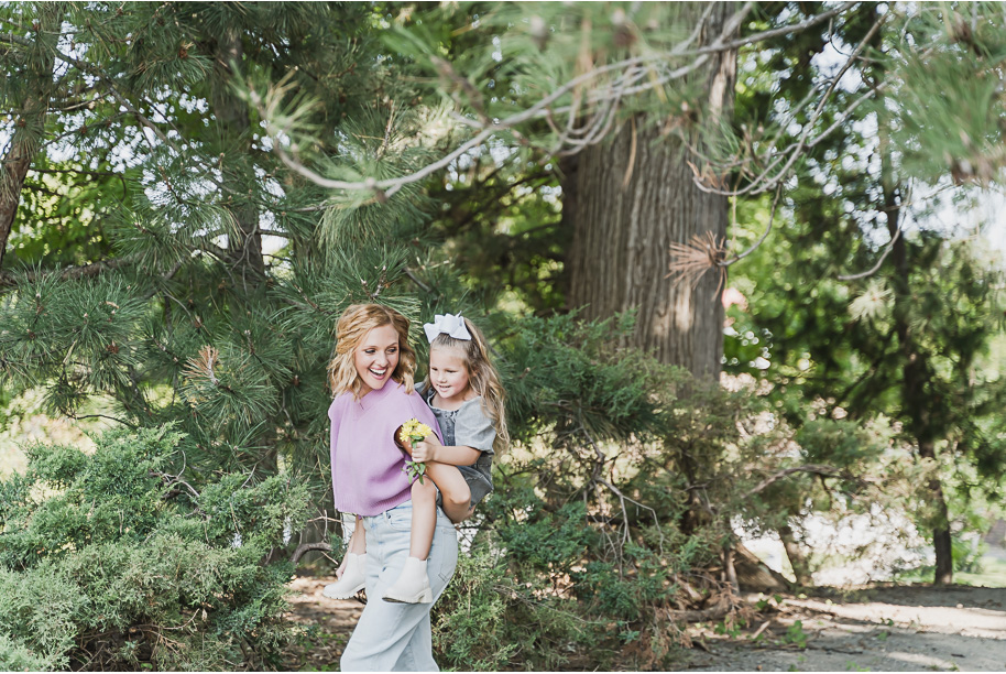 A fun Greenfield Village family photo session in Dearborn, Michigan provided by top-rated Detroit portrait and wedding photographer Kari Dawson.