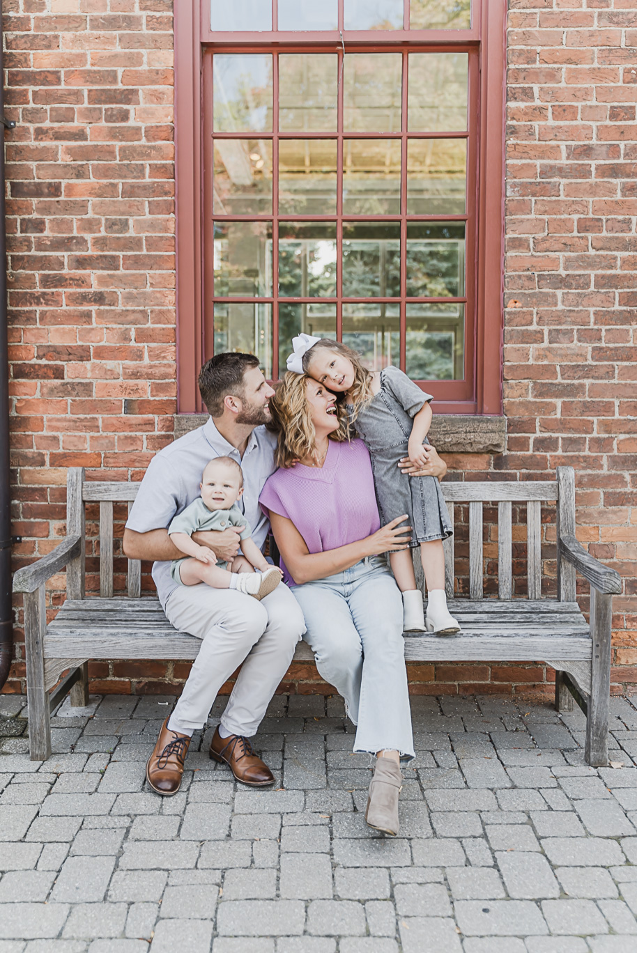 A fun Greenfield Village family photo session in Dearborn, Michigan provided by top-rated Detroit portrait and wedding photographer Kari Dawson.