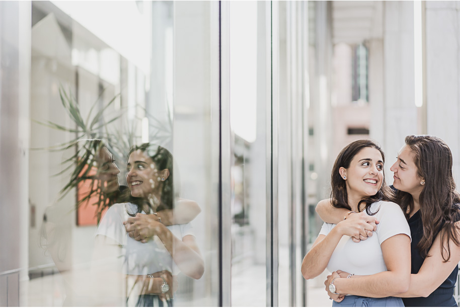 A same sex downtown Detroit engagement session in the summer provided by top-rated Detroit wedding photographer Kari Dawson.