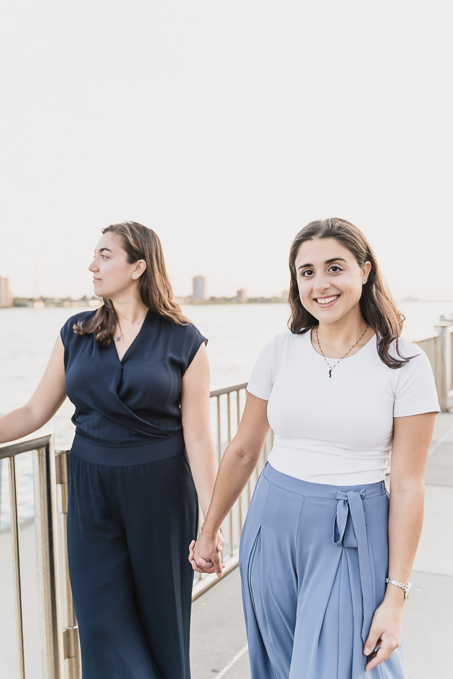 A same sex downtown Detroit engagement session in the summer provided by top-rated Detroit wedding photographer Kari Dawson.