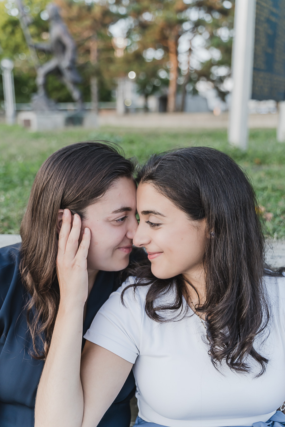 A same sex downtown Detroit engagement session in the summer provided by top-rated Detroit wedding photographer Kari Dawson.