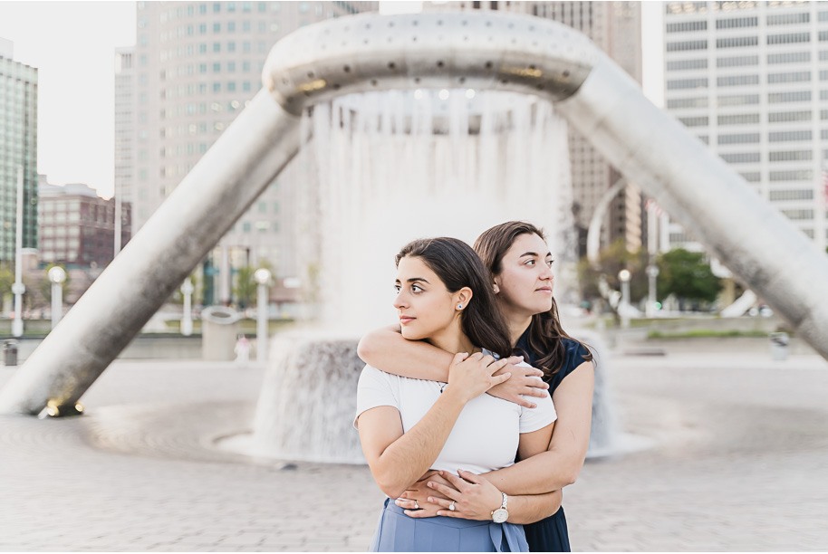 A same sex downtown Detroit engagement session in the summer provided by top-rated Detroit wedding photographer Kari Dawson.