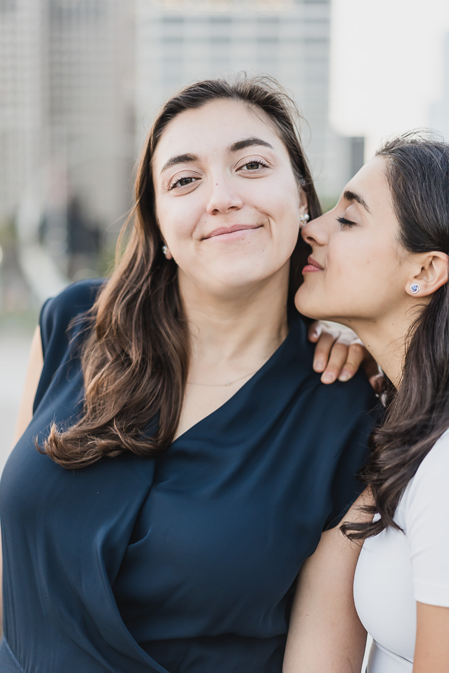 A same sex downtown Detroit engagement session in the summer provided by top-rated Detroit wedding photographer Kari Dawson.