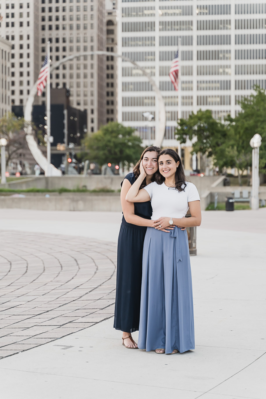 A same sex downtown Detroit engagement session in the summer provided by top-rated Detroit wedding photographer Kari Dawson.