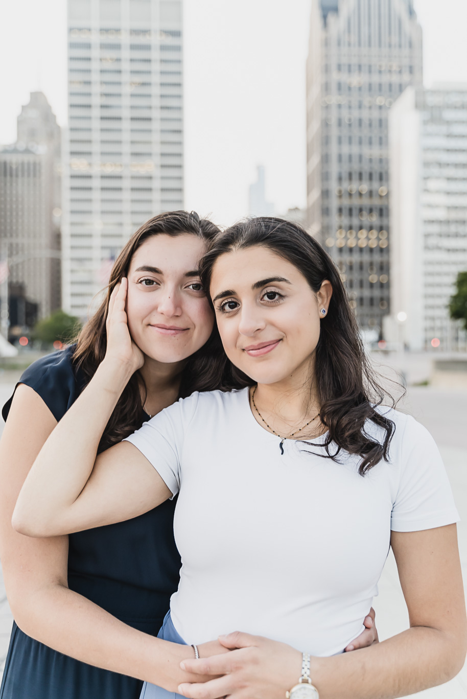 A same sex downtown Detroit engagement session in the summer provided by top-rated Detroit wedding photographer Kari Dawson.