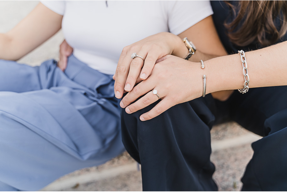 A same sex downtown Detroit engagement session in the summer provided by top-rated Detroit wedding photographer Kari Dawson.