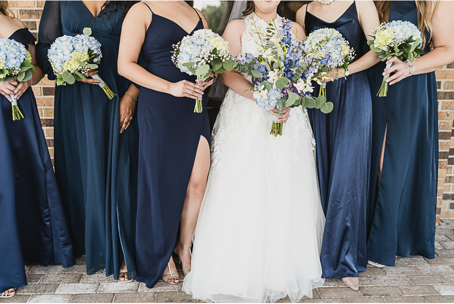 A classic navy and black summer San Marino Club wedding in Sterling Heights provided by top-rated Detroit wedding photographer Kari Dawson.