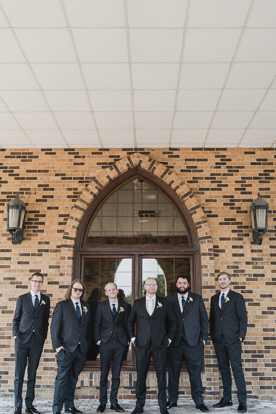 A classic navy and black summer San Marino Club wedding in Sterling Heights provided by top-rated Detroit wedding photographer Kari Dawson.