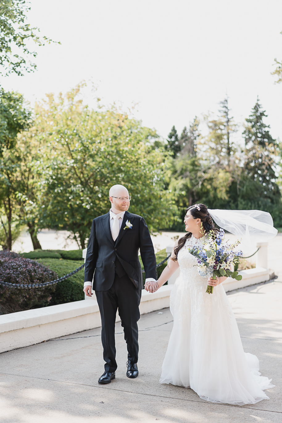 A classic navy and black summer San Marino Club wedding in Sterling Heights provided by top-rated Detroit wedding photographer Kari Dawson.