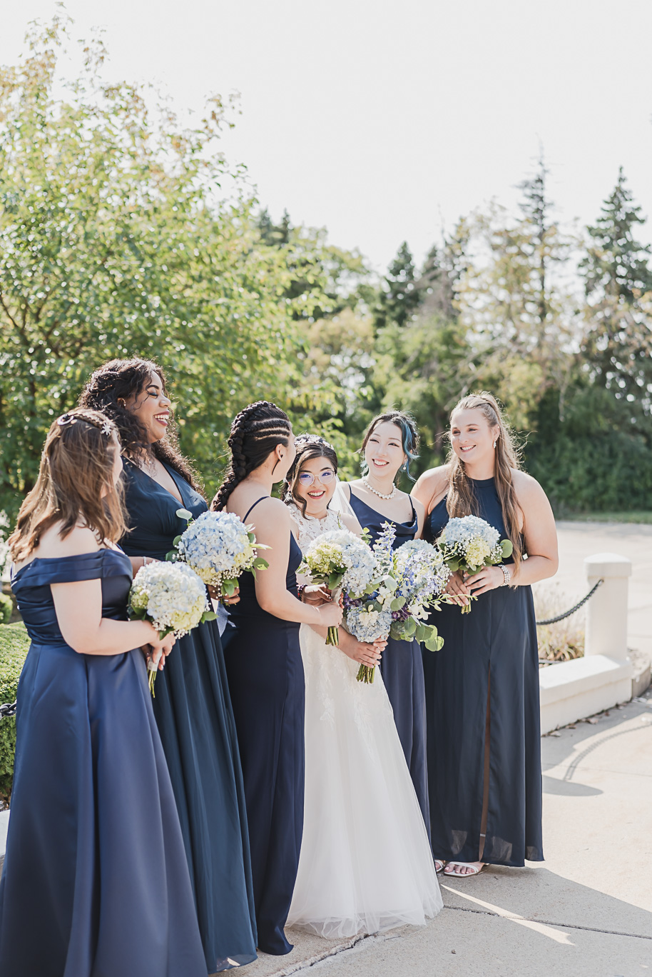 A classic navy and black summer San Marino Club wedding in Sterling Heights provided by top-rated Detroit wedding photographer Kari Dawson.