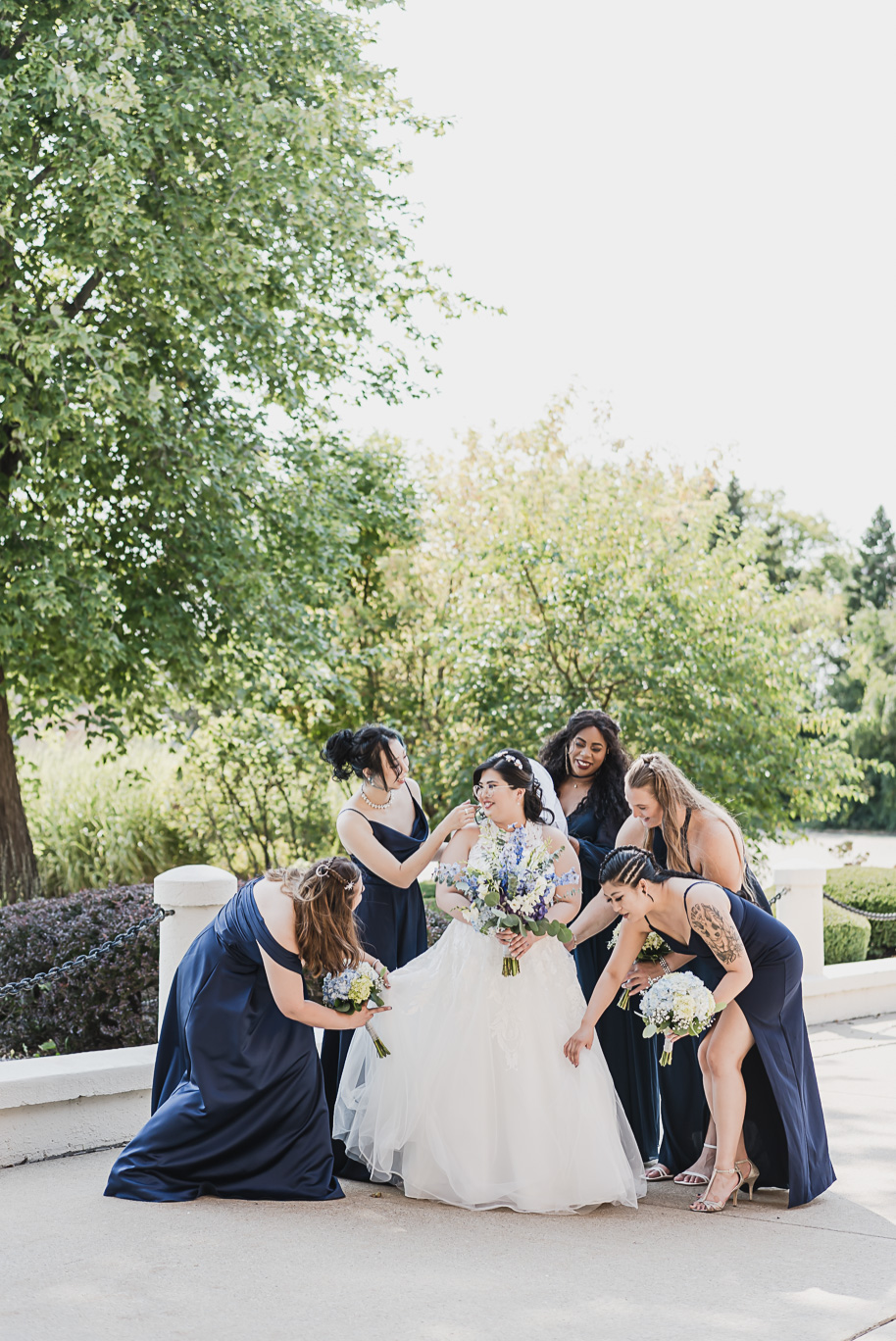 A classic navy and black summer San Marino Club wedding in Sterling Heights provided by top-rated Detroit wedding photographer Kari Dawson.