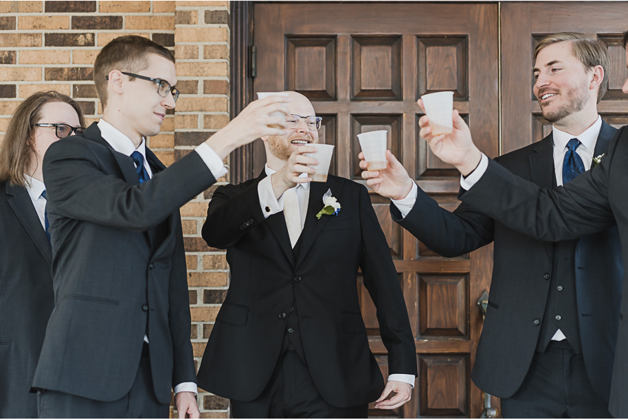 A classic navy and black summer San Marino Club wedding in Sterling Heights provided by top-rated Detroit wedding photographer Kari Dawson.