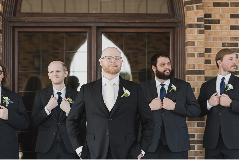 A classic navy and black summer San Marino Club wedding in Sterling Heights provided by top-rated Detroit wedding photographer Kari Dawson.