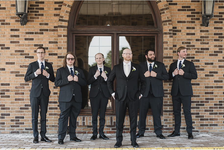 A classic navy and black summer San Marino Club wedding in Sterling Heights provided by top-rated Detroit wedding photographer Kari Dawson.