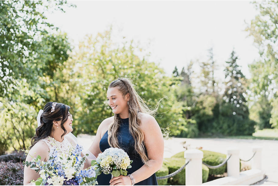 A classic navy and black summer San Marino Club wedding in Sterling Heights provided by top-rated Detroit wedding photographer Kari Dawson.