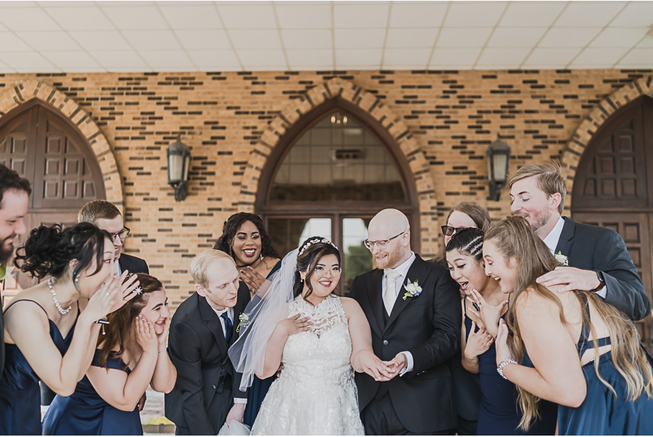 A classic navy and black summer San Marino Club wedding in Sterling Heights provided by top-rated Detroit wedding photographer Kari Dawson.