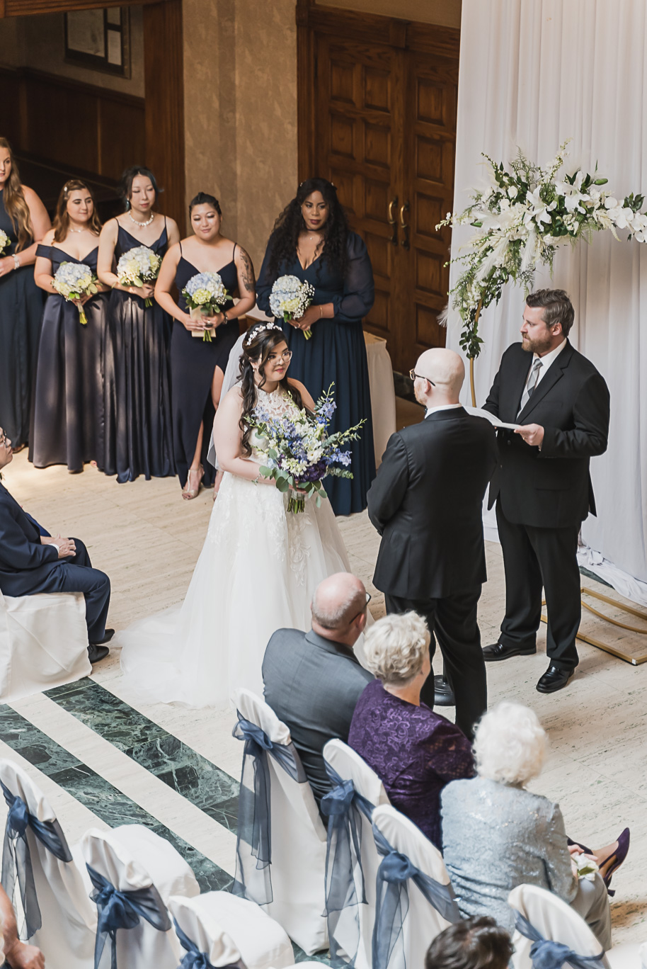 A classic navy and black summer San Marino Club wedding in Sterling Heights provided by top-rated Detroit wedding photographer Kari Dawson.