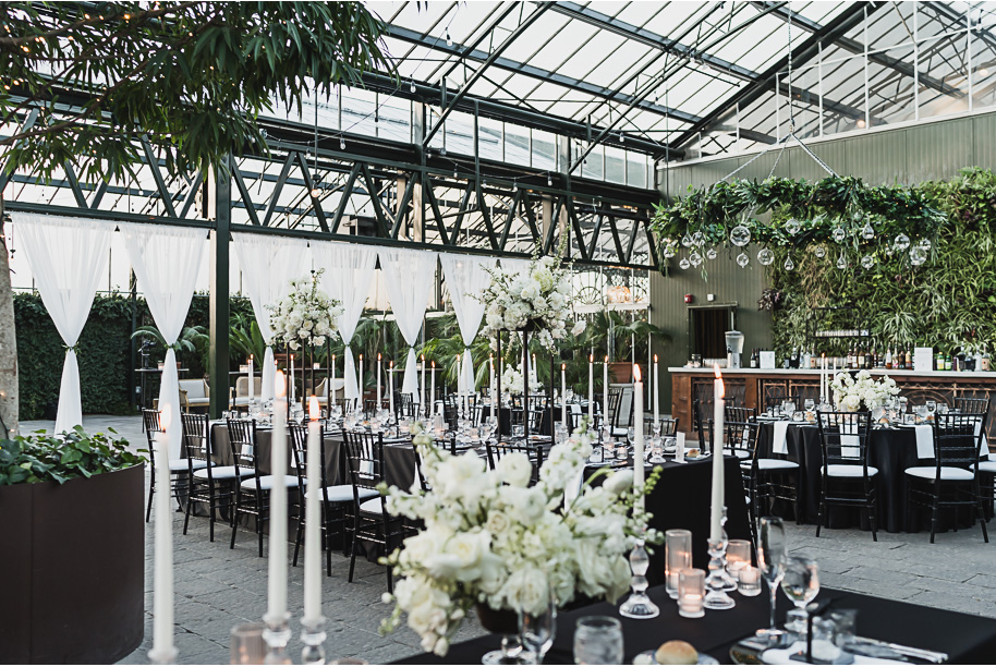 A classic black and white black tie winter Planterra wedding in West Bloomfield, Michigan provided by top-rated Detroit wedding photographer, Kari Dawson and her team.