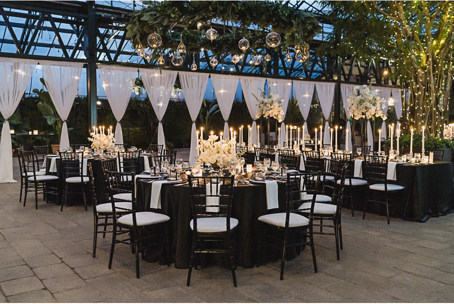 A classic black and white black tie winter Planterra wedding in West Bloomfield, Michigan provided by top-rated Detroit wedding photographer, Kari Dawson and her team.