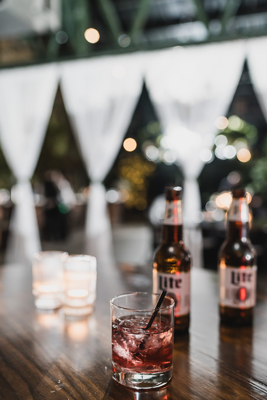 A classic black and white black tie winter Planterra wedding in West Bloomfield, Michigan provided by top-rated Detroit wedding photographer, Kari Dawson and her team.