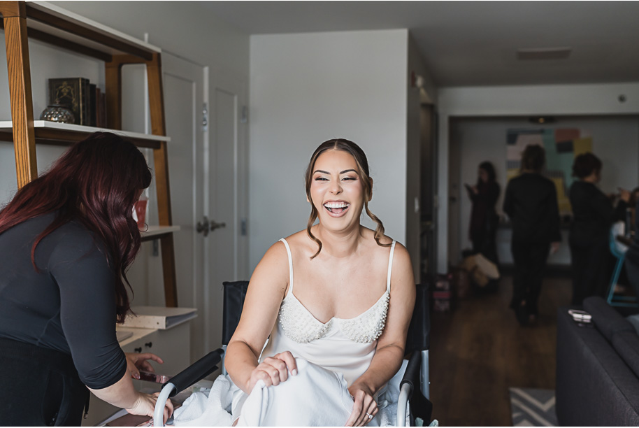 A classic black and white black tie winter Planterra wedding in West Bloomfield, Michigan provided by top-rated Detroit wedding photographer, Kari Dawson and her team.