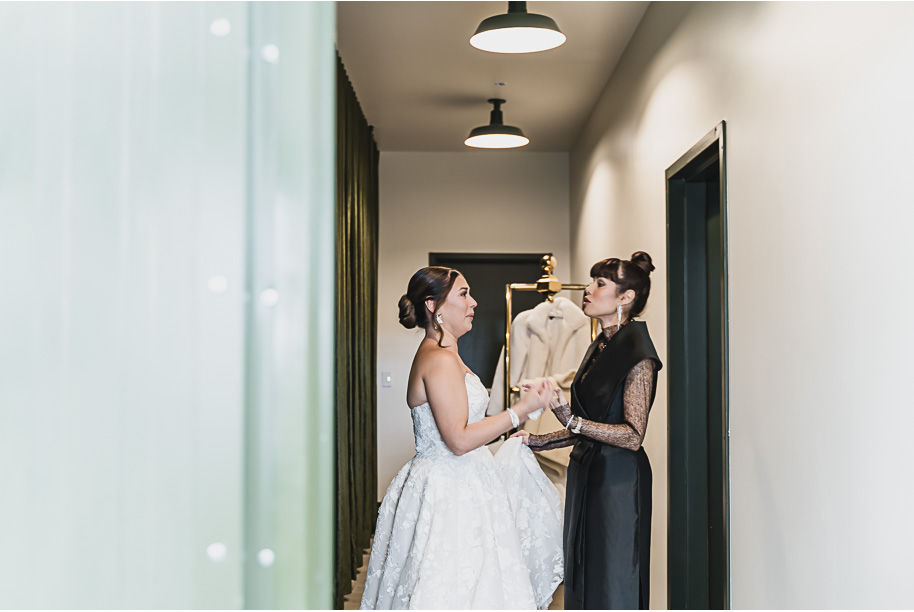 A classic black and white black tie winter Planterra wedding in West Bloomfield, Michigan provided by top-rated Detroit wedding photographer, Kari Dawson and her team.