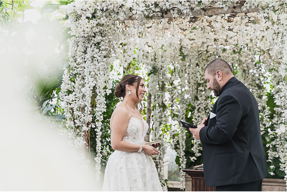 A classic black and white black tie winter Planterra wedding in West Bloomfield, Michigan provided by top-rated Detroit wedding photographer, Kari Dawson and her team.