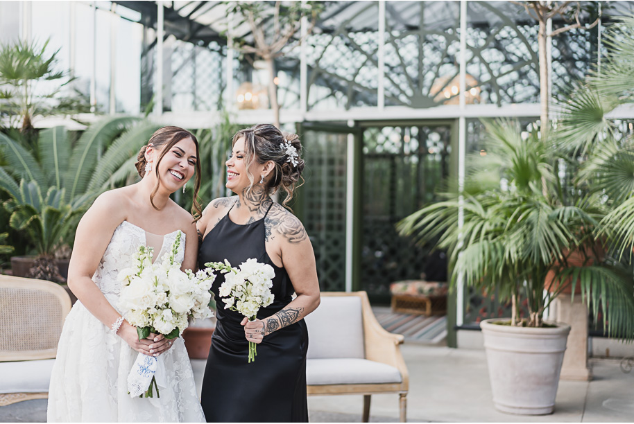 A classic black and white black tie winter Planterra wedding in West Bloomfield, Michigan provided by top-rated Detroit wedding photographer, Kari Dawson and her team.