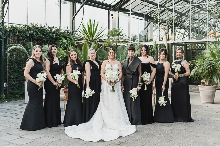 A classic black and white black tie winter Planterra wedding in West Bloomfield, Michigan provided by top-rated Detroit wedding photographer, Kari Dawson and her team.