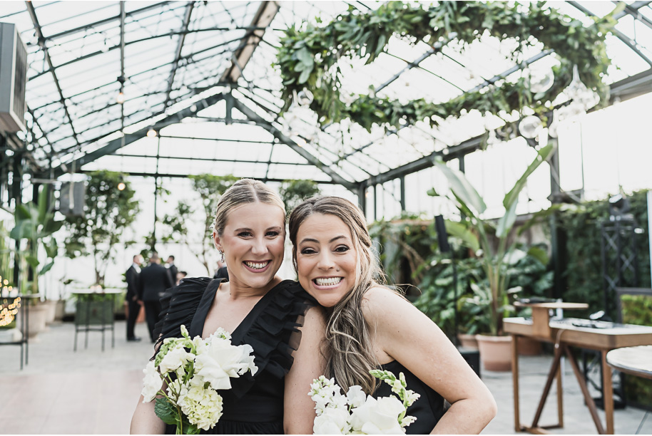 A classic black and white black tie winter Planterra wedding in West Bloomfield, Michigan provided by top-rated Detroit wedding photographer, Kari Dawson and her team.