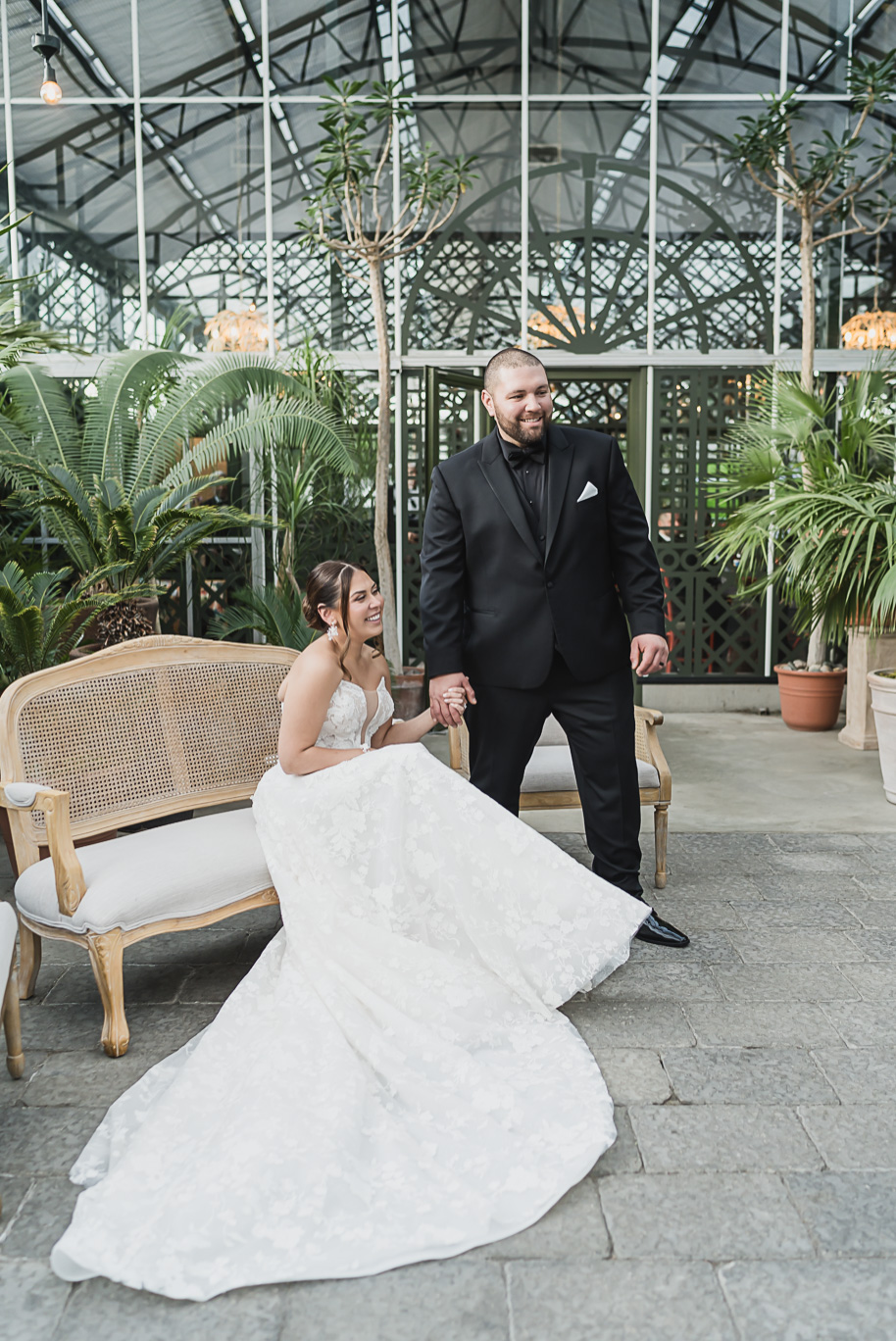 A classic black and white black tie winter Planterra wedding in West Bloomfield, Michigan provided by top-rated Detroit wedding photographer, Kari Dawson and her team.