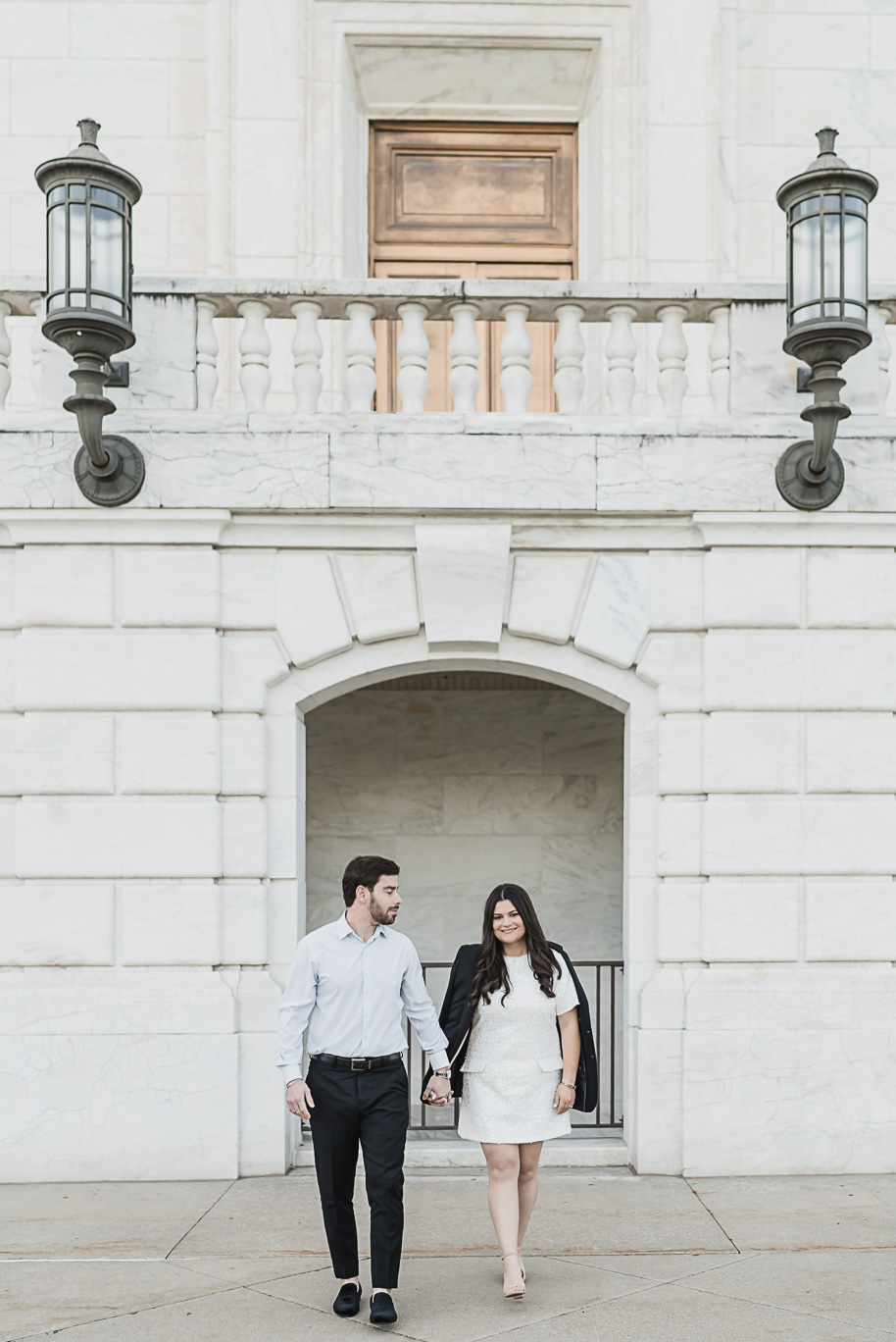 A fun candid moment for this couple during their Detroit Institute of Arts downtown Detroit Engagement photos by Kari Dawson