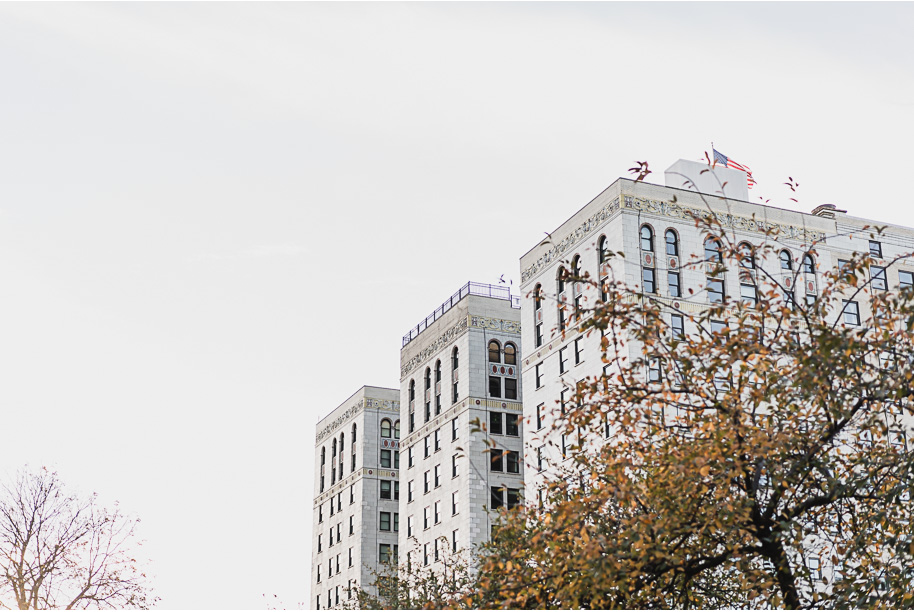 A fun candid moment for this couple during their z lot rooftop downtown Detroit Engagement photos by Kari Dawson