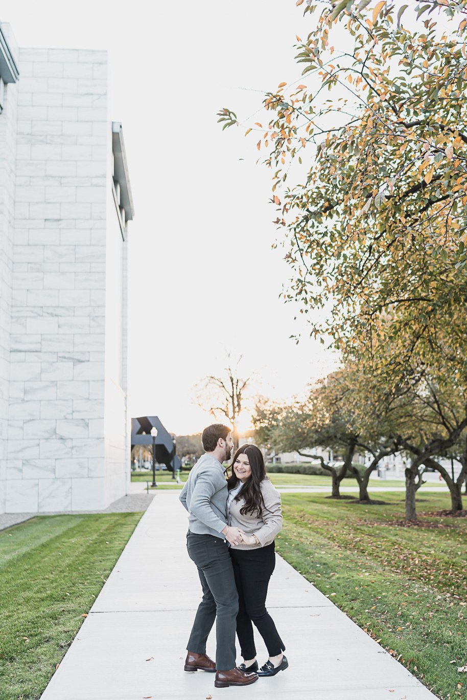 A fun candid moment for this couple during their Detroit Institute of Arts downtown Detroit Engagement photos by Kari Dawson