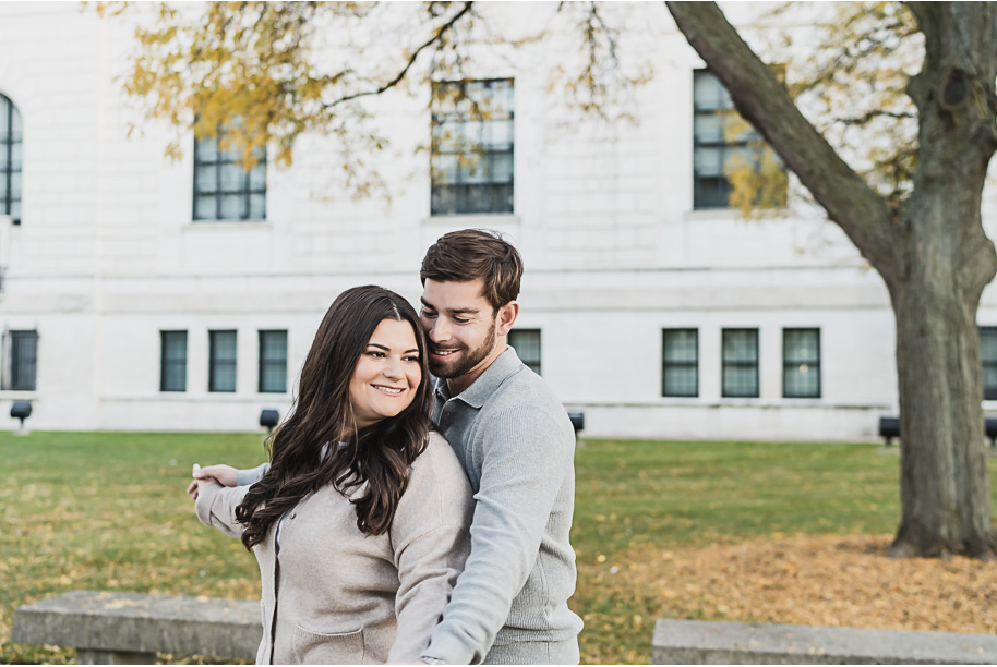 A fun candid moment for this couple during their Detroit Institute of Arts downtown Detroit Engagement photos by Kari Dawson