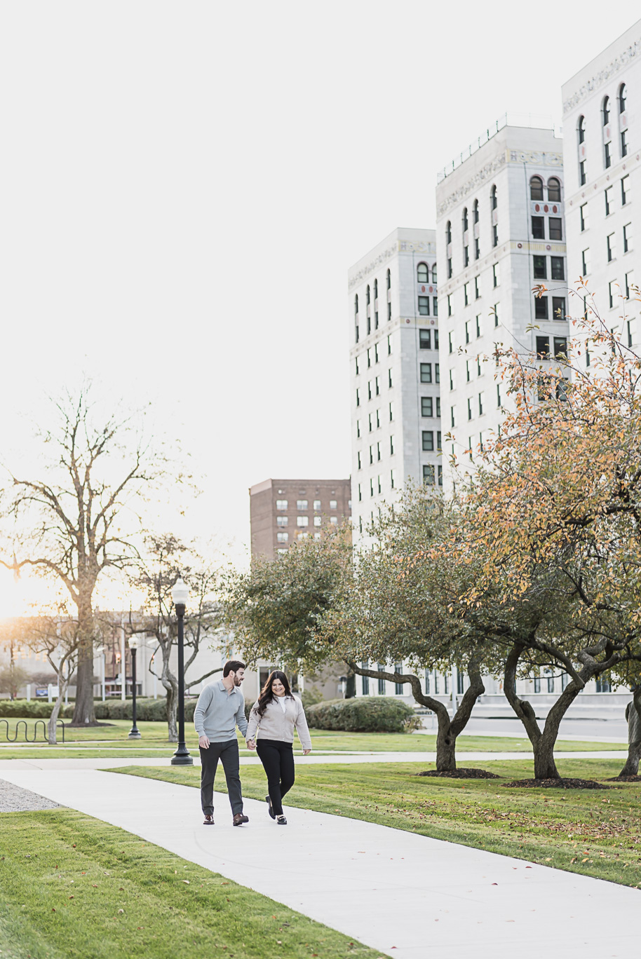 A fun candid moment for this couple during their Detroit Institute of Arts downtown Detroit Engagement photos by Kari Dawson