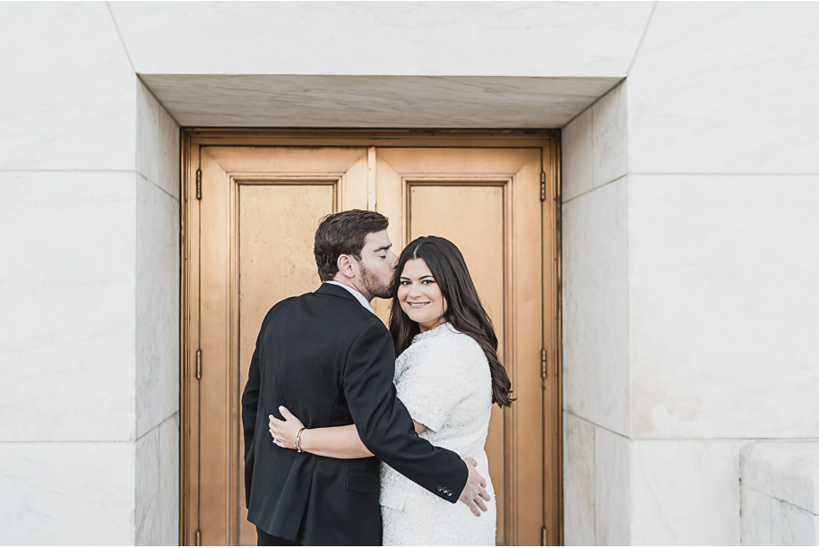 A fun candid moment for this couple during their Detroit Institute of Arts downtown Detroit Engagement photos by Kari Dawson