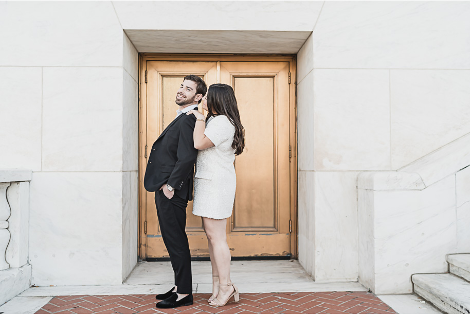 A fun candid moment for this couple during their Detroit Institute of Arts downtown Detroit Engagement photos by Kari Dawson