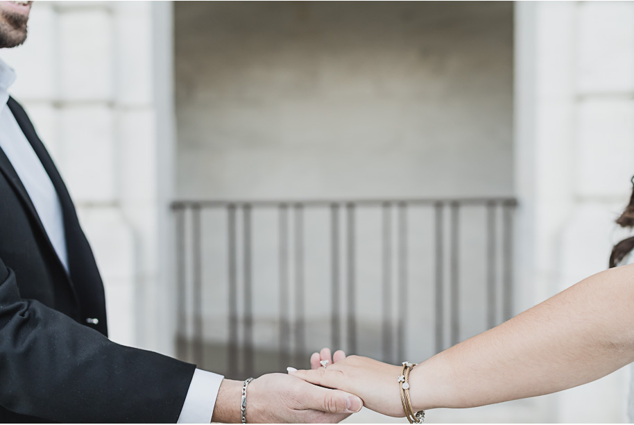 A spotlight on that gorgeous engagement ring for this couple at the DIA during their downtown Detroit engagement photos by Kari Dawson