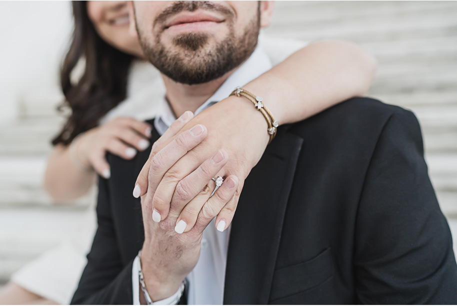 A spotlight on that gorgeous engagement ring for this couple at the DIA during their downtown Detroit engagement photos by Kari Dawson