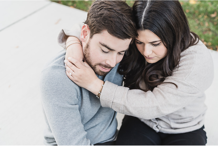 A tender authentic moment for this couple during their Detroit Institute of Arts downtown Detroit Engagement photos by Kari Dawson