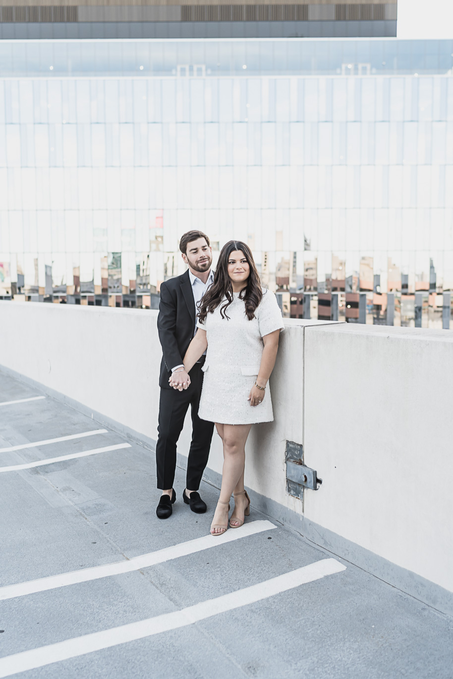 An editorial moment for this couple during their z lot rooftop downtown Detroit Engagement photos by Kari Dawson