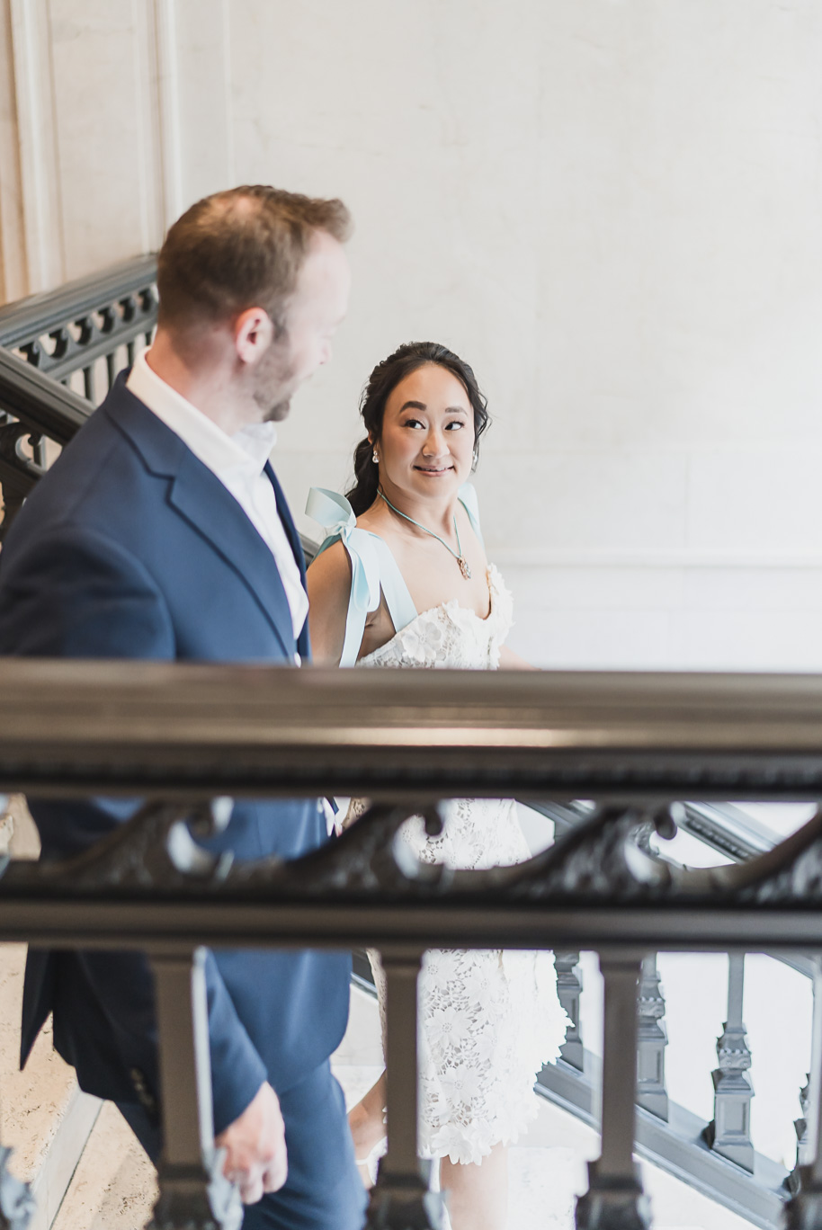 Book Tower engagement photos in Detroit by top-rated Detroit Wedding Photographers Kari Dawson + Co
