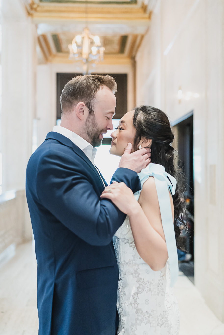 Book Tower engagement photos in Detroit by top-rated Detroit Wedding Photographers Kari Dawson + Co
